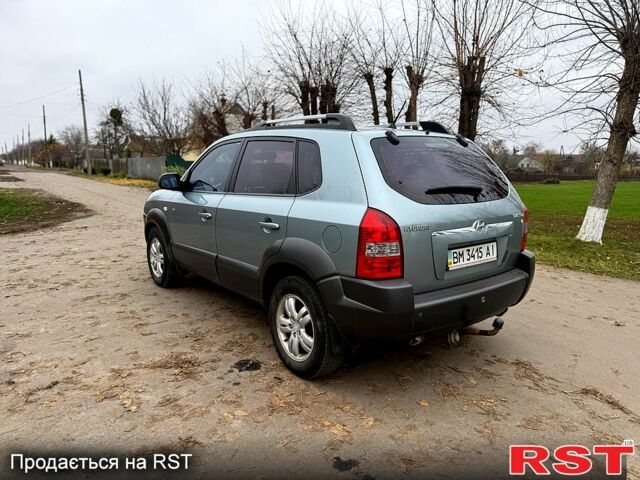Серый Хендай Туксон, объемом двигателя 2.7 л и пробегом 228 тыс. км за 7650 $, фото 2 на Automoto.ua