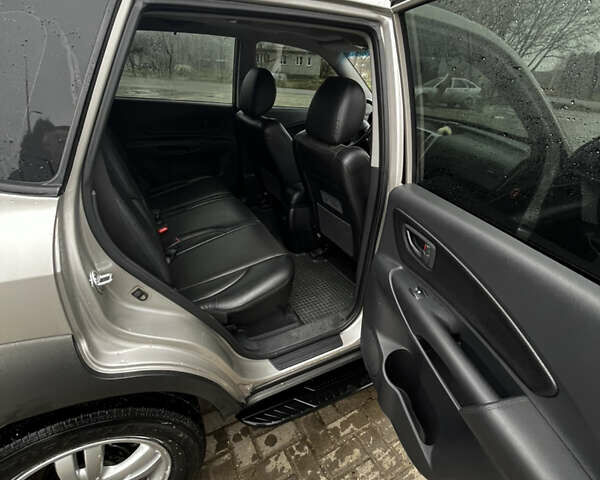 Сірий Хендай Туксон, об'ємом двигуна 1.98 л та пробігом 36 тис. км за 12800 $, фото 6 на Automoto.ua