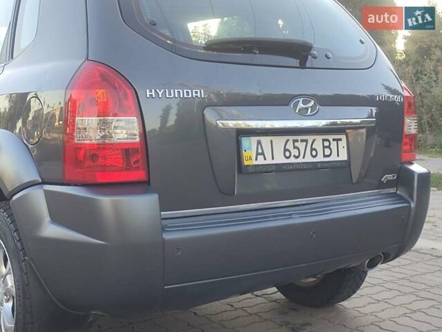 Сірий Хендай Туксон, об'ємом двигуна 2 л та пробігом 234 тис. км за 8750 $, фото 25 на Automoto.ua