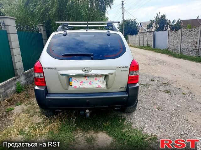 Сірий Хендай Туксон, об'ємом двигуна 2 л та пробігом 135 тис. км за 9700 $, фото 1 на Automoto.ua