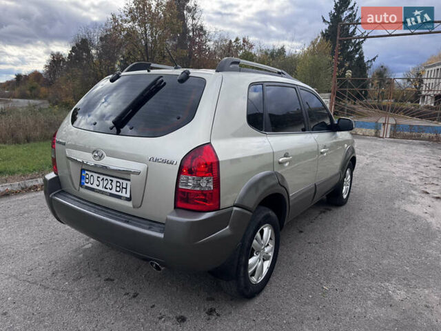 Серый Хендай Туксон, объемом двигателя 2 л и пробегом 228 тыс. км за 6900 $, фото 5 на Automoto.ua