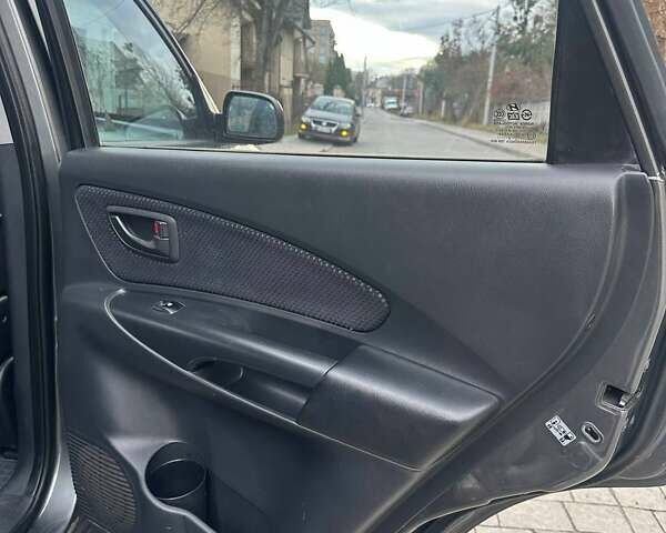 Сірий Хендай Туксон, об'ємом двигуна 1.99 л та пробігом 221 тис. км за 6000 $, фото 13 на Automoto.ua