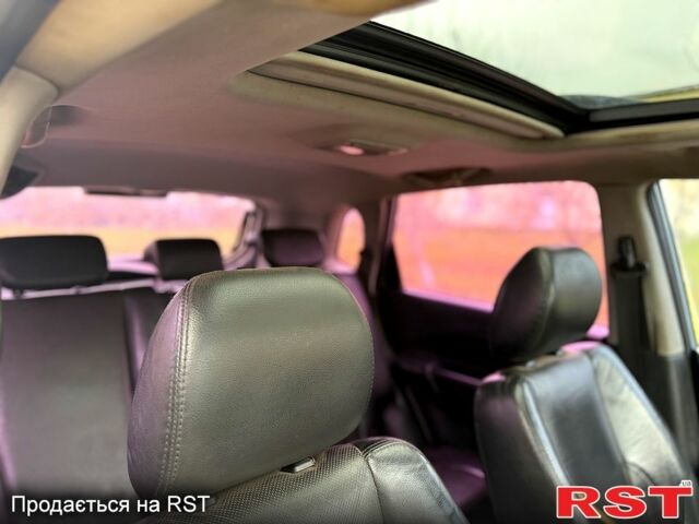 Серый Хендай Туксон, объемом двигателя 2.7 л и пробегом 228 тыс. км за 7650 $, фото 7 на Automoto.ua