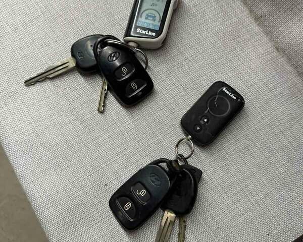 Серый Хендай Туксон, объемом двигателя 2 л и пробегом 217 тыс. км за 8200 $, фото 24 на Automoto.ua