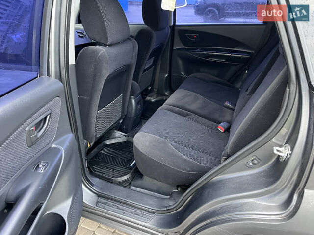 Серый Хендай Туксон, объемом двигателя 2 л и пробегом 198 тыс. км за 8900 $, фото 5 на Automoto.ua