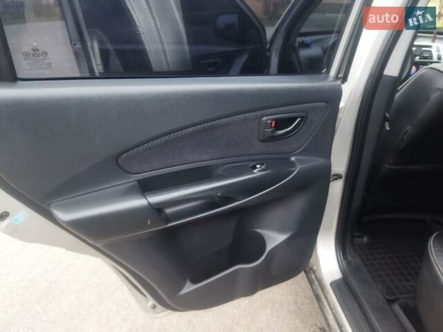 Серый Хендай Туксон, объемом двигателя 2 л и пробегом 210 тыс. км за 8200 $, фото 8 на Automoto.ua