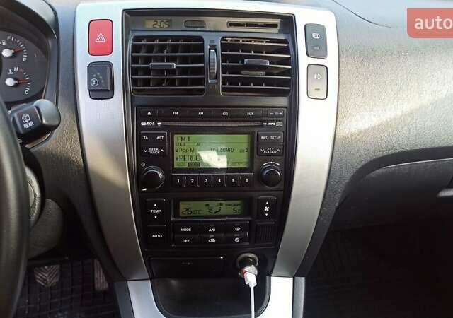 Серый Хендай Туксон, объемом двигателя 2 л и пробегом 127 тыс. км за 9300 $, фото 26 на Automoto.ua