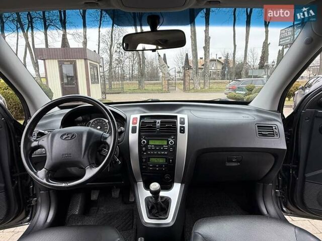 Сірий Хендай Туксон, об'ємом двигуна 2 л та пробігом 187 тис. км за 7700 $, фото 41 на Automoto.ua