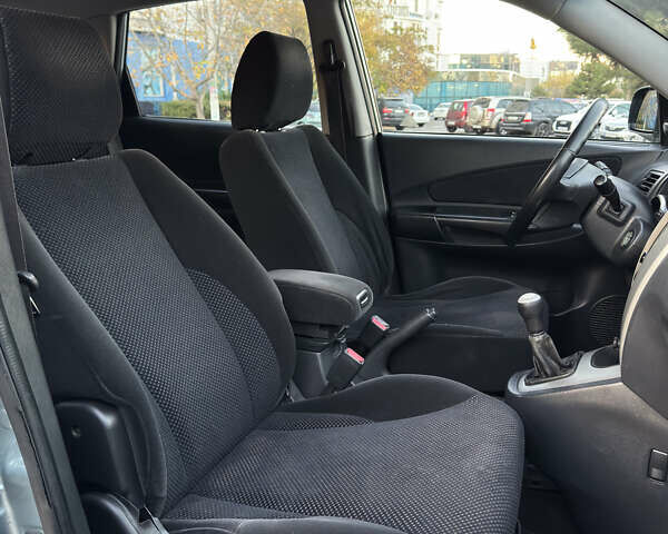 Серый Хендай Туксон, объемом двигателя 1.98 л и пробегом 246 тыс. км за 7500 $, фото 16 на Automoto.ua