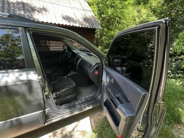 Хендай Туксон 2008 в Мукачеве на Automoto.ua Серый Хендай Туксон, объемом двигателя 2 л и пробегом 300 тыс. км за 7800 $, фото 6 на Automoto.ua