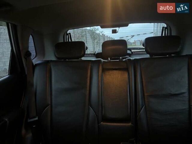 Серый Хендай Туксон, объемом двигателя 1.99 л и пробегом 132 тыс. км за 10000 $, фото 3 на Automoto.ua