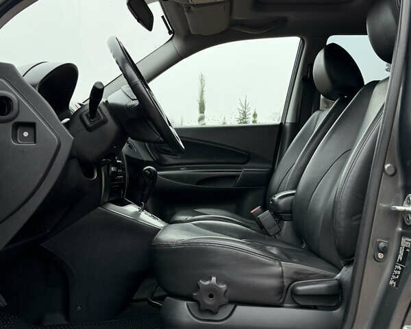 Серый Хендай Туксон, объемом двигателя 2 л и пробегом 86 тыс. км за 9800 $, фото 48 на Automoto.ua