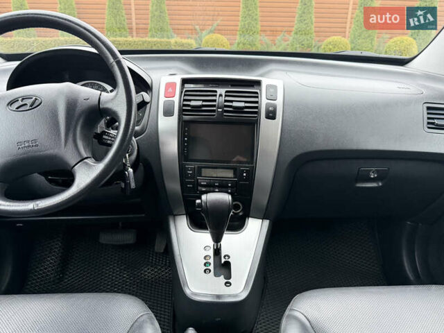 Серый Хендай Туксон, объемом двигателя 2 л и пробегом 86 тыс. км за 9800 $, фото 36 на Automoto.ua