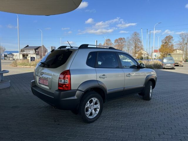 Сірий Хендай Туксон, об'ємом двигуна 2 л та пробігом 166 тис. км за 8950 $, фото 5 на Automoto.ua