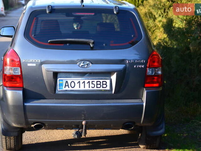 Серый Хендай Туксон, объемом двигателя 2 л и пробегом 271 тыс. км за 8000 $, фото 7 на Automoto.ua