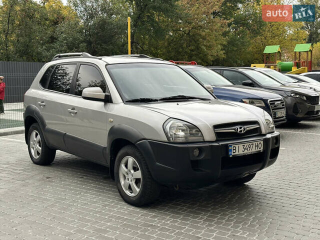 Сірий Хендай Туксон, об'ємом двигуна 1.98 л та пробігом 227 тис. км за 7800 $, фото 11 на Automoto.ua