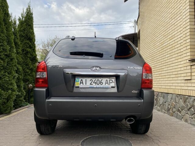 Серый Хендай Туксон, объемом двигателя 2 л и пробегом 148 тыс. км за 10400 $, фото 5 на Automoto.ua