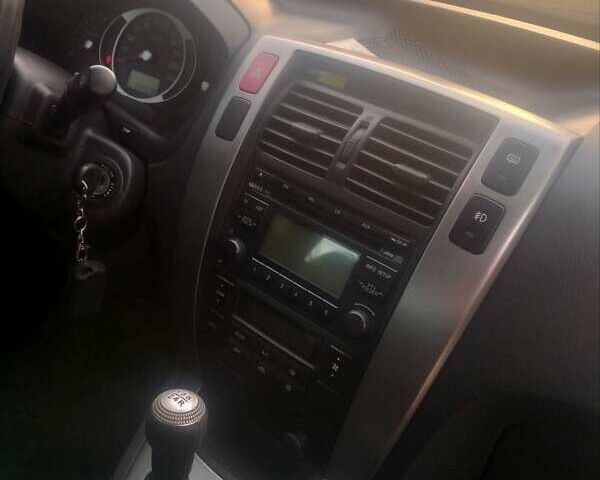 Сірий Хендай Туксон, об'ємом двигуна 1.98 л та пробігом 84 тис. км за 9200 $, фото 6 на Automoto.ua