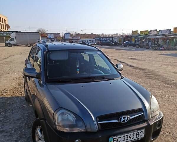Серый Хендай Туксон, объемом двигателя 1.98 л и пробегом 250 тыс. км за 6999 $, фото 10 на Automoto.ua