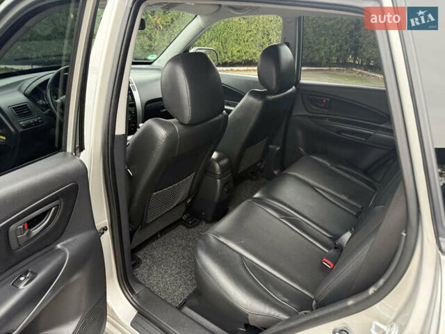 Серый Хендай Туксон, объемом двигателя 2 л и пробегом 195 тыс. км за 9950 $, фото 9 на Automoto.ua