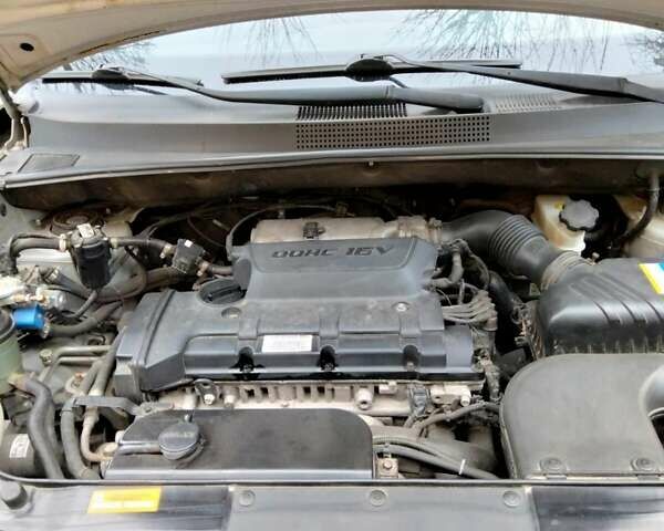 Сірий Хендай Туксон, об'ємом двигуна 2 л та пробігом 225 тис. км за 8700 $, фото 8 на Automoto.ua