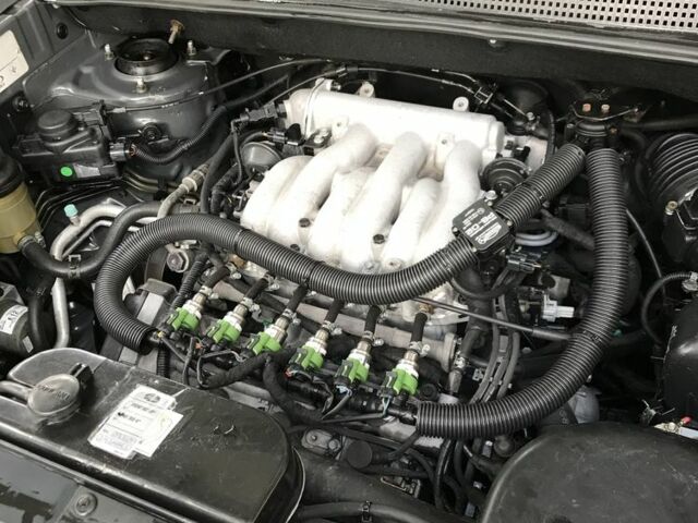 Серый Хендай Туксон, объемом двигателя 2.7 л и пробегом 215 тыс. км за 7900 $, фото 1 на Automoto.ua