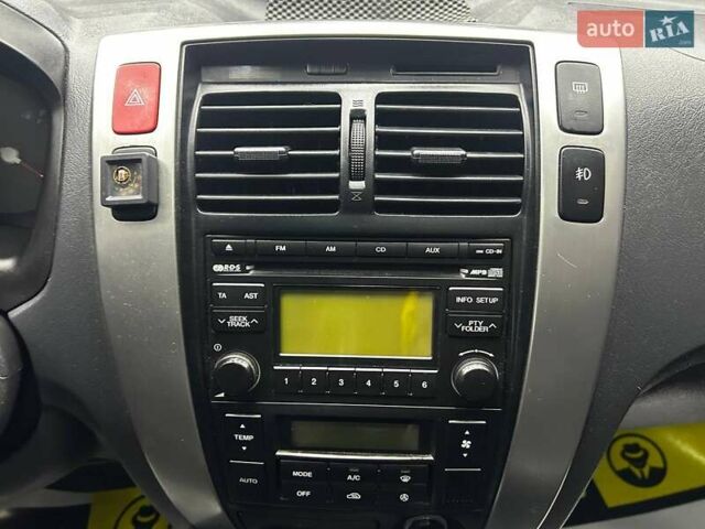 Сірий Хендай Туксон, об'ємом двигуна 2.66 л та пробігом 165 тис. км за 10000 $, фото 17 на Automoto.ua