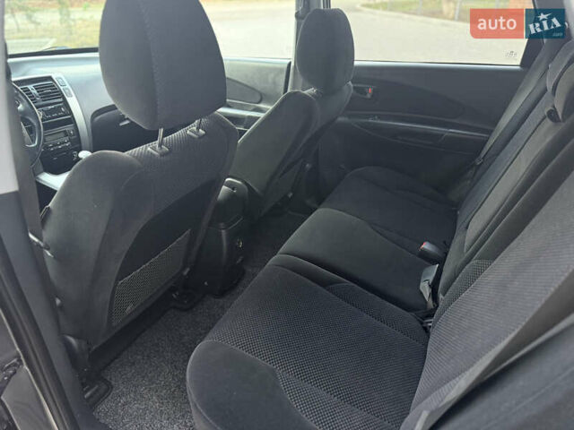 Серый Хендай Туксон, объемом двигателя 2 л и пробегом 202 тыс. км за 10000 $, фото 26 на Automoto.ua