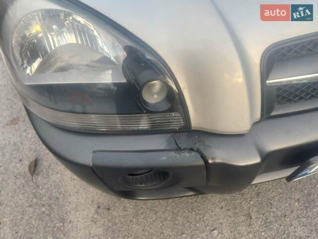 Сірий Хендай Туксон, об'ємом двигуна 1.98 л та пробігом 84 тис. км за 9200 $, фото 4 на Automoto.ua