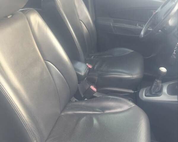 Сірий Хендай Туксон, об'ємом двигуна 1.98 л та пробігом 84 тис. км за 9200 $, фото 7 на Automoto.ua