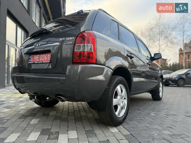 Серый Хендай Туксон, объемом двигателя 2 л и пробегом 202 тыс. км за 10000 $, фото 8 на Automoto.ua