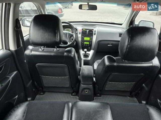 Серый Хендай Туксон, объемом двигателя 1.98 л и пробегом 189 тыс. км за 8300 $, фото 12 на Automoto.ua