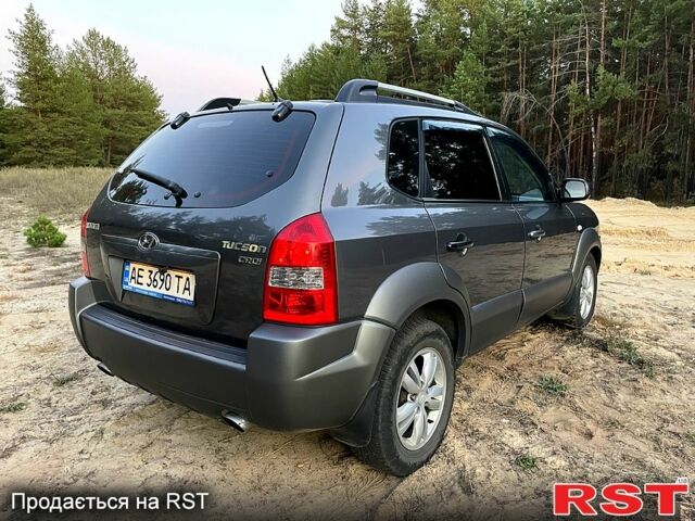Серый Хендай Туксон, объемом двигателя 2 л и пробегом 130 тыс. км за 8700 $, фото 1 на Automoto.ua