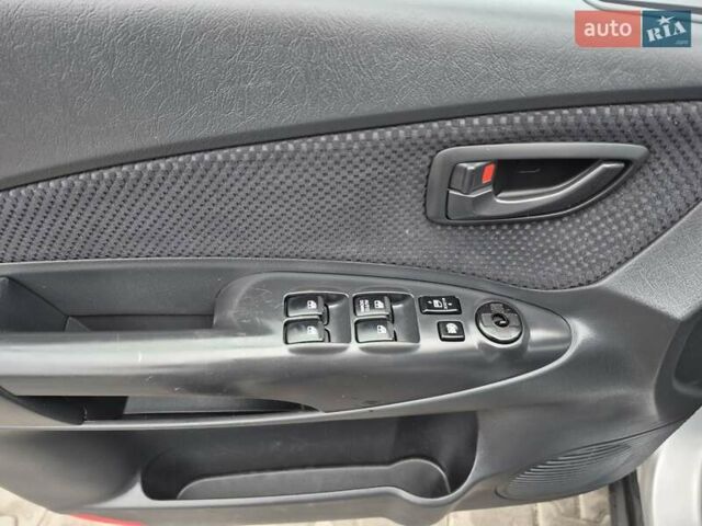 Серый Хендай Туксон, объемом двигателя 1.98 л и пробегом 189 тыс. км за 8300 $, фото 25 на Automoto.ua