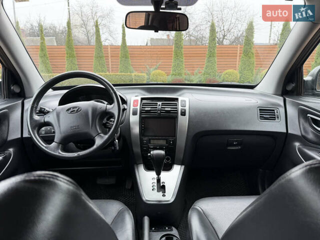 Серый Хендай Туксон, объемом двигателя 2 л и пробегом 86 тыс. км за 9800 $, фото 35 на Automoto.ua