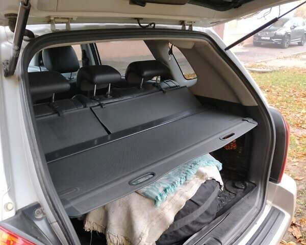 Сірий Хендай Туксон, об'ємом двигуна 2 л та пробігом 225 тис. км за 8700 $, фото 5 на Automoto.ua