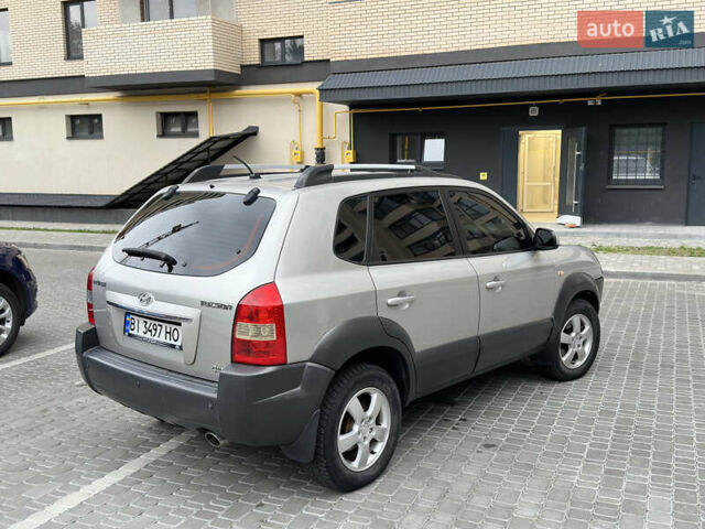 Сірий Хендай Туксон, об'ємом двигуна 1.98 л та пробігом 227 тис. км за 7800 $, фото 6 на Automoto.ua