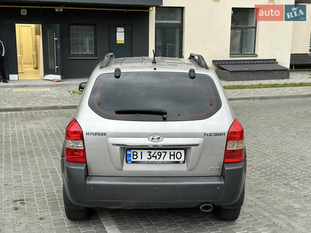 Сірий Хендай Туксон, об'ємом двигуна 1.98 л та пробігом 227 тис. км за 7800 $, фото 5 на Automoto.ua