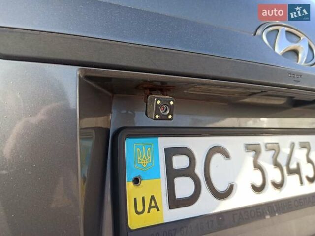 Серый Хендай Туксон, объемом двигателя 1.98 л и пробегом 250 тыс. км за 6999 $, фото 3 на Automoto.ua