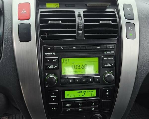 Серый Хендай Туксон, объемом двигателя 1.98 л и пробегом 189 тыс. км за 8300 $, фото 29 на Automoto.ua