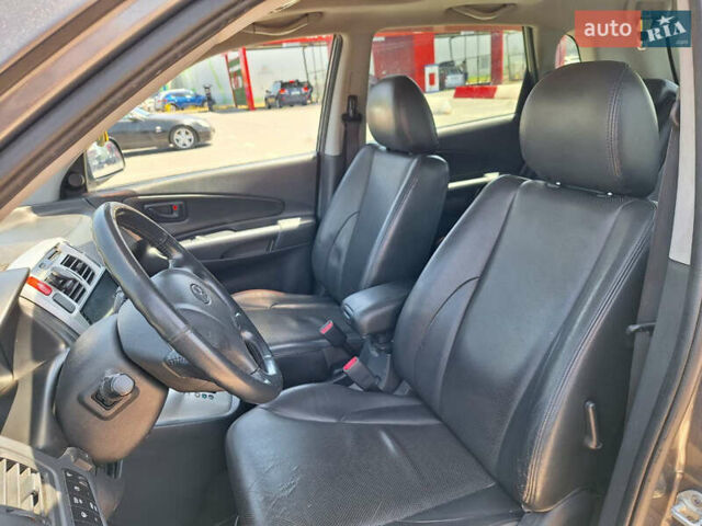 Серый Хендай Туксон, объемом двигателя 1.98 л и пробегом 228 тыс. км за 8700 $, фото 9 на Automoto.ua