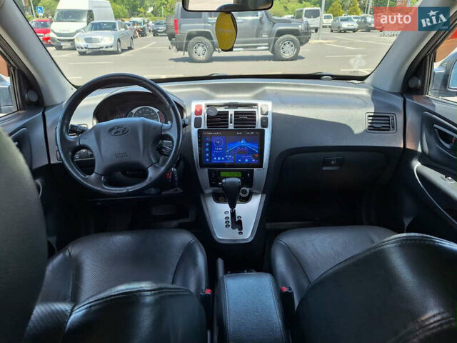 Серый Хендай Туксон, объемом двигателя 1.98 л и пробегом 228 тыс. км за 8700 $, фото 12 на Automoto.ua