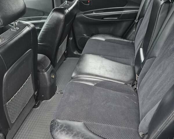 Серый Хендай Туксон, объемом двигателя 1.98 л и пробегом 189 тыс. км за 8300 $, фото 21 на Automoto.ua