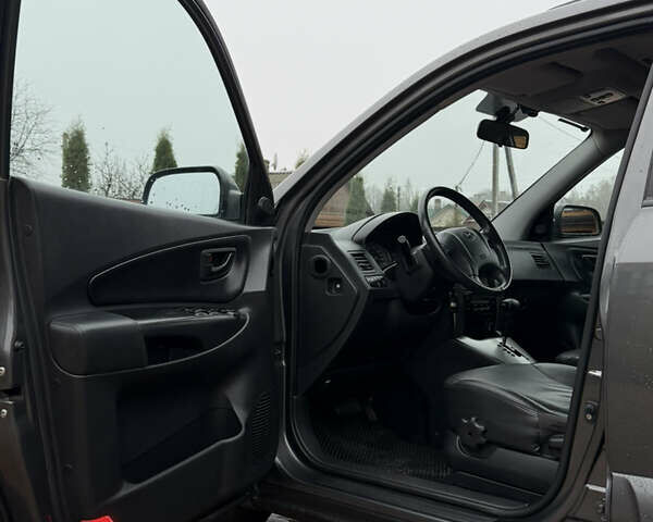 Серый Хендай Туксон, объемом двигателя 2 л и пробегом 86 тыс. км за 9800 $, фото 42 на Automoto.ua