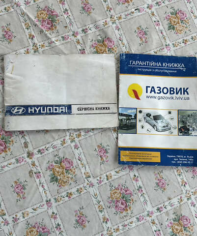 Сірий Хендай Туксон, об'ємом двигуна 1.98 л та пробігом 250 тис. км за 5400 $, фото 16 на Automoto.ua