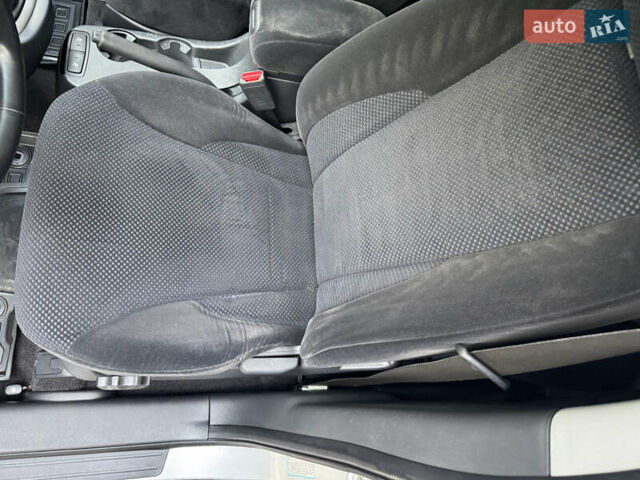 Сірий Хендай Туксон, об'ємом двигуна 2 л та пробігом 124 тис. км за 8900 $, фото 10 на Automoto.ua