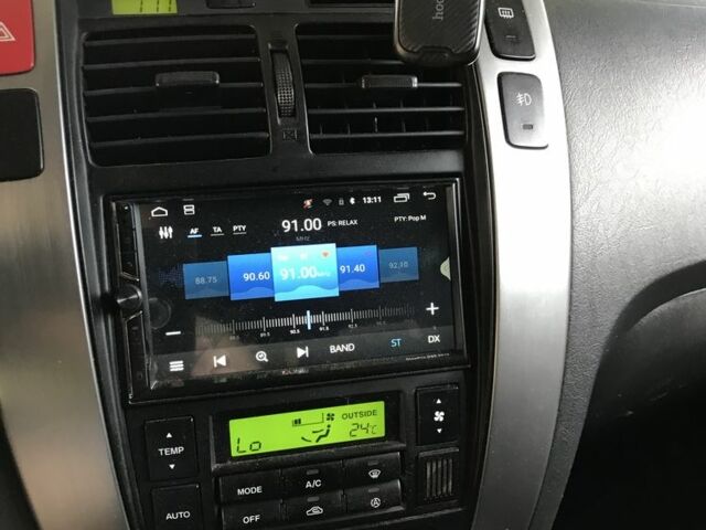 Серый Хендай Туксон, объемом двигателя 2.7 л и пробегом 215 тыс. км за 7900 $, фото 5 на Automoto.ua