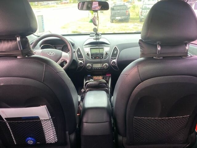 Сірий Хендай Туксон, об'ємом двигуна 2 л та пробігом 206 тис. км за 11500 $, фото 10 на Automoto.ua