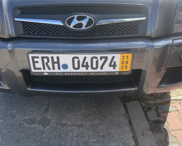 Серый Хендай Туксон, объемом двигателя 1.98 л и пробегом 117 тыс. км за 10350 $, фото 6 на Automoto.ua