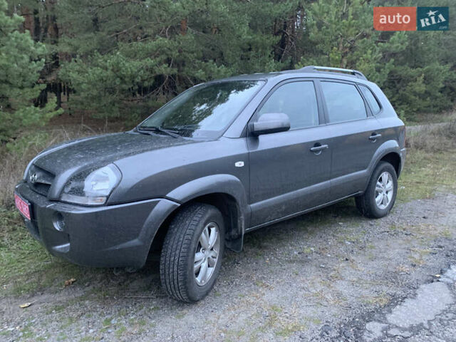 Серый Хендай Туксон, объемом двигателя 1.98 л и пробегом 117 тыс. км за 10350 $, фото 28 на Automoto.ua